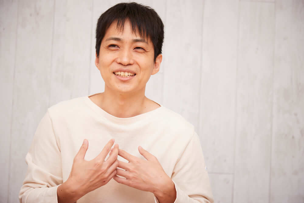 写真:インタビューに応じる白井さん